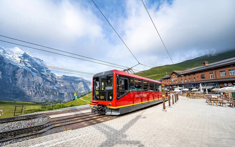 Jungfrau Railway to Jungfraujoch at Kleine Scheidegg stop, rack railway, mountains behind, Jungfrau region, Bernese Oberland, Switzerland