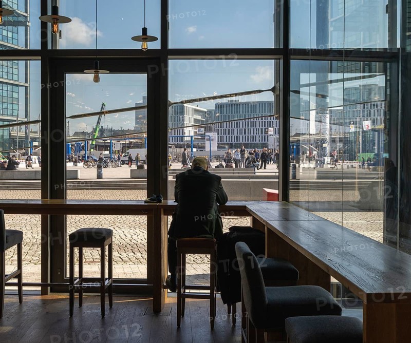 Guest in a Berlin cafe near the main train station, Berlin, Germany