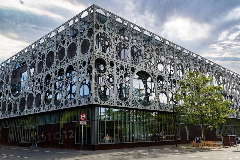 Faculty of Technology, University of Southern Denmark, façade, glass and metal, circular hole pattern in metal plates, modern architecture, Syddansk University, Odense, Funen Island, Denmark