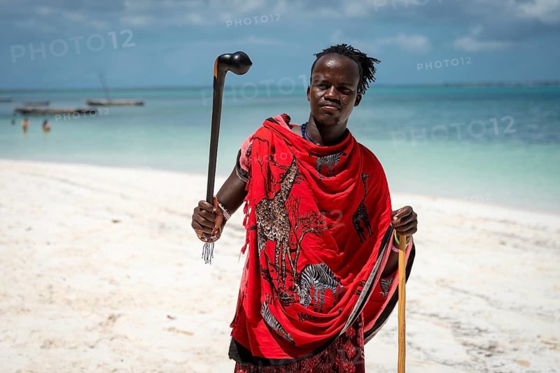 MICHAMVI KAE, ZANZIBAR - OCTOBER 14, 2025: Masai with a Rungu stick, a traditional Masai weapon