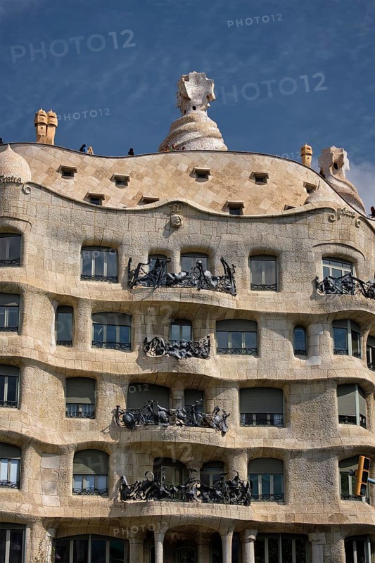 BARCELONA, SPAIN, APRIL 15, 2019: Famous Casa Mila house know as La Pedrera modernist building in Barcelona, Catalonia, Spain designed by architect Antoni Gaudi