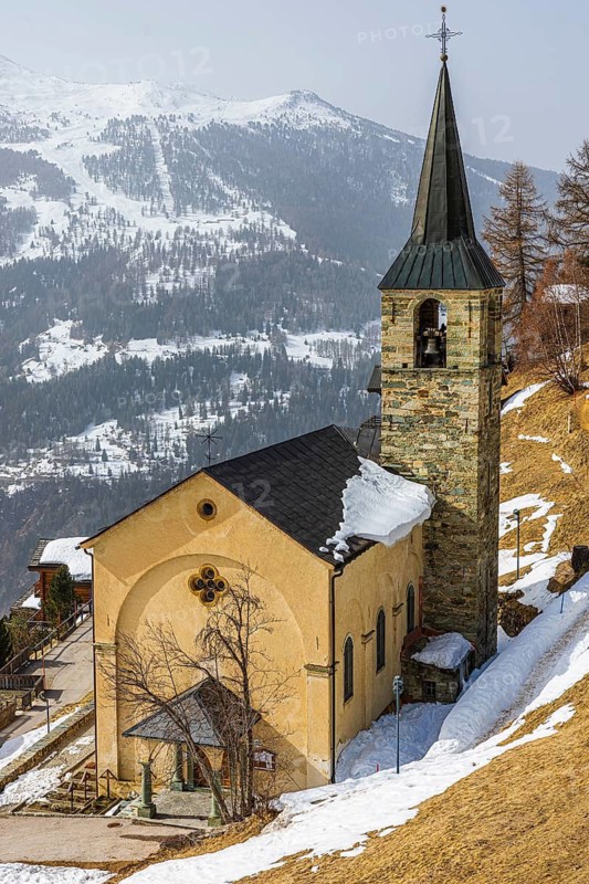 Bartok church Sainte Barbe surrounded by remnants of snow, Chandolin, Val d'Anniviers, Valais Alps, Canton of Valais, Switzerland