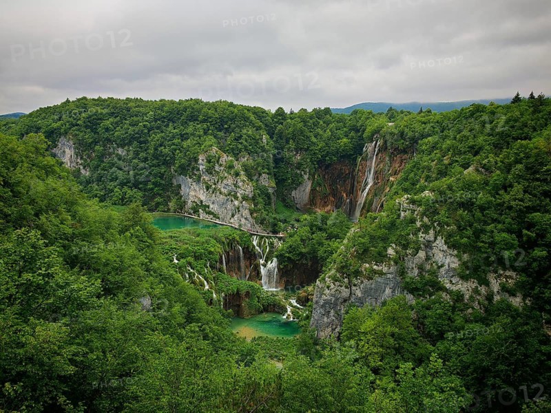 Panorama of majestic landscape with waterfalls and lush forest, Plitvice Lakes National Park, Croatia