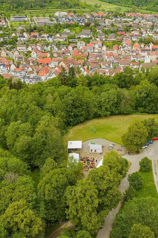 Cityscape with adjacent forest and tent event in the foreground, Father's Day, Forest Festival, Aidlingen, Böblingen District, Germany