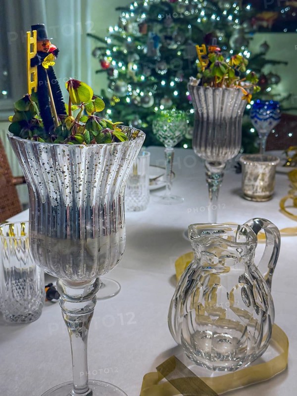 Christmas table decoration with various glasses and carafes