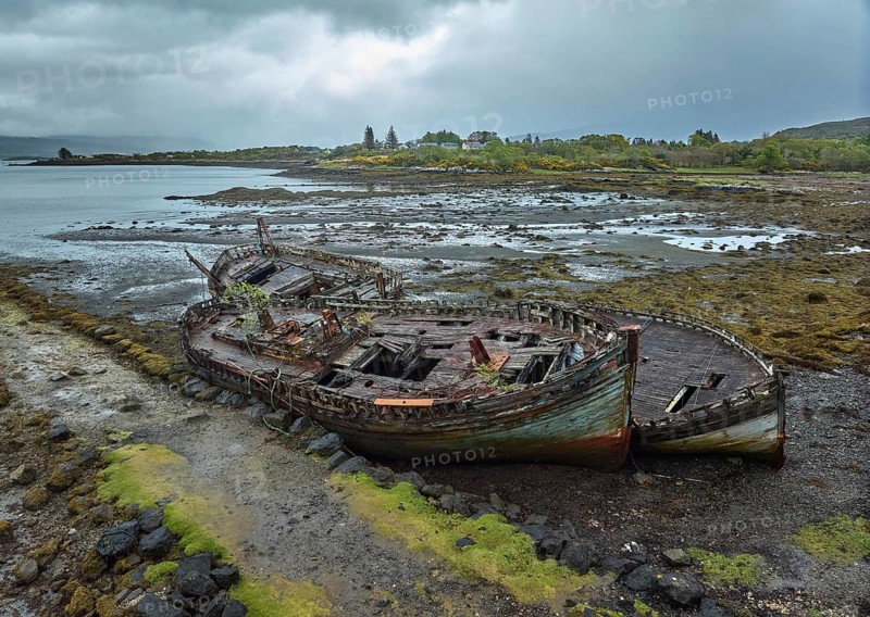 Drone photo of a ship's wreck on the shore of Isle of Mull, Tobermory, Scotland, UK