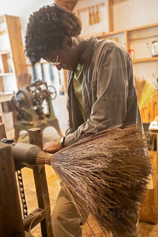 Berea, Kentucky - Aja Haynes makes traditional Appalachian brooms and whiskbrooms, by hand at Sunhouse Craft. They use broomcorn, a type of sorghum, and distribute their products through wholesalers and direct to consumers