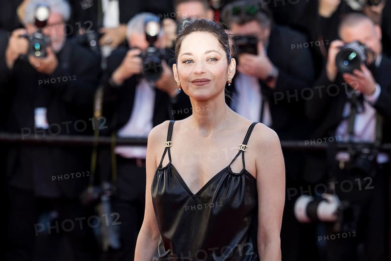 Marion Cotillard with Karma on the Red Carpet at the Palais des Festivals et des Congrès during the 79th Cannes International Film Festival. The 79th Cannes International Film Festival will take place from May 12 to 23, 2026