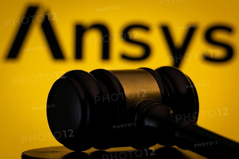 Dhaka, Bangladesh - 12 May 2026: A wooden judge's gavel is seen in front of the Ansys logo displayed on a screen