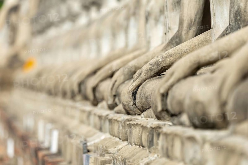 Row of Buddha statues (Bhumispara-mudra, Buddha Gautama at the moment of enlightenment), Great Chedi Chaya Mongkol, Wat Yai Chai Mongkon, Ayutthaya, Thailand