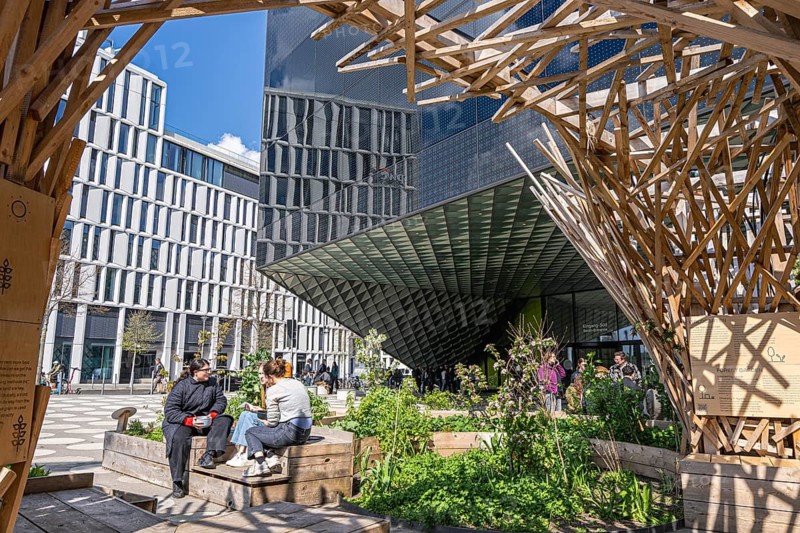 Wooden sculpture on the theme of nature and land in front of the Futurium Museum on Kapelle Ufer, Berlin, Germany