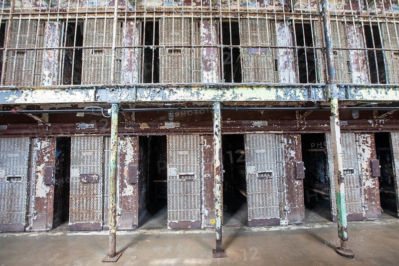 Mansfield, Ohio - Jail cells on the East Cell Block at the Ohio State Reformatory. The prison opened in 1896 and was closed in 1990 by a federal court because of overcrowding and inhumane conditions. Built for 1500 inmates, it held more than twice that number much of the time. The prison now offers daily tours, and has been the site of many films