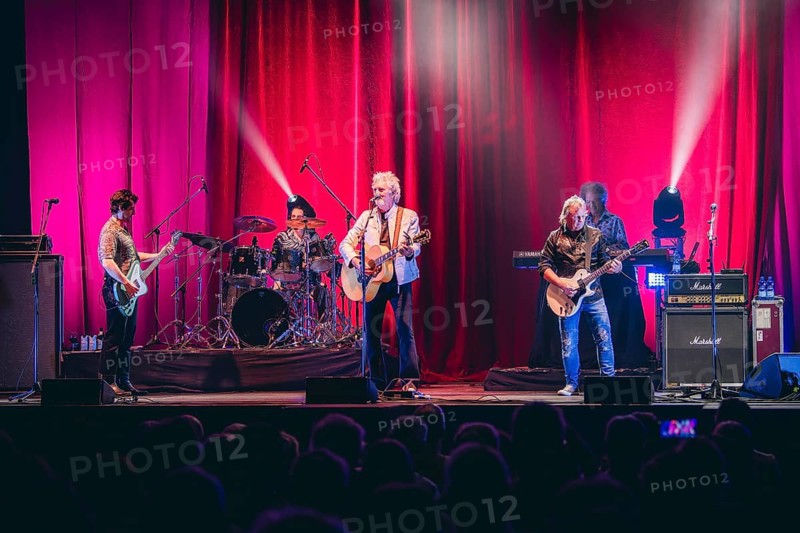 Hatch Bullard (bassist), Steve Pinnell (drummer), Pete Lincoln (singer and guitarist), Mick McConnell (guitarist) and Martin Bullard (keyboardist) from Smokie live on 50 Years of Music - Tour 2026 at the Uber Eats Music Hall in Berlin on 28 May 2026