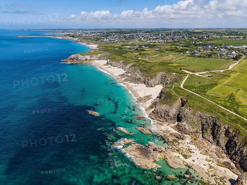 Aerial view of the sandy beach, Plage des Charettes beach north of Pointe Corsen, a cape at the westernmost point of continental France on the Breton coast, on the horizon the village of Kervilon, Commune of Plouarzel, Finistère, Brittany, France
