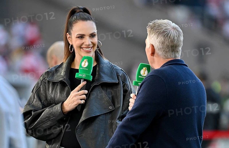 Bastian Schweinsteiger in interview, discussion with presenter reporter ARD Esther Sedlaczek, microphone, logo, smiles, soccer Bundesliga, DFB-Pokal, MHPArena, MHP Arena Stuttgart, Baden-Württemberg, Germany