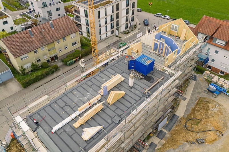 Construction site under construction with open roof area and cranes, residential building renovation, Nagold, Calw district, Germany