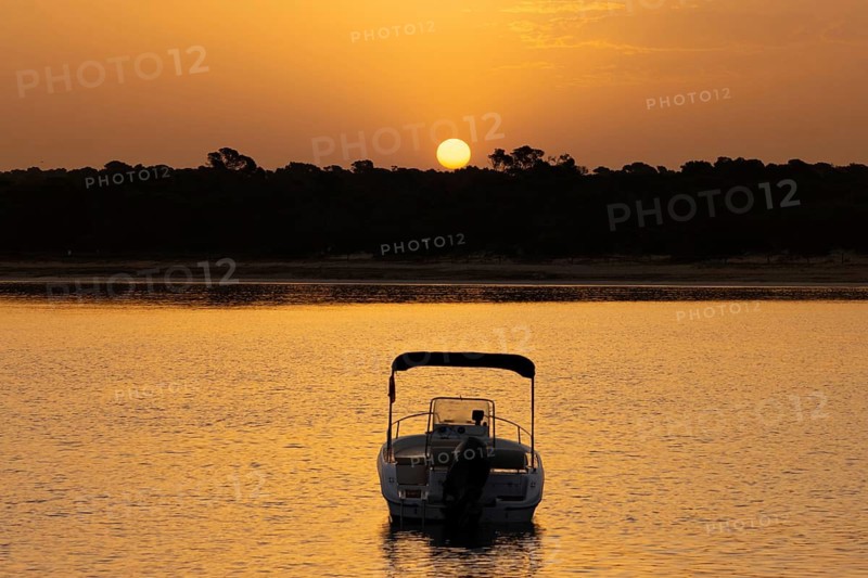 The sun rises on the Spanish Balearic island of Majorca, Colonia de Sant Jordi, Majorca, Spain