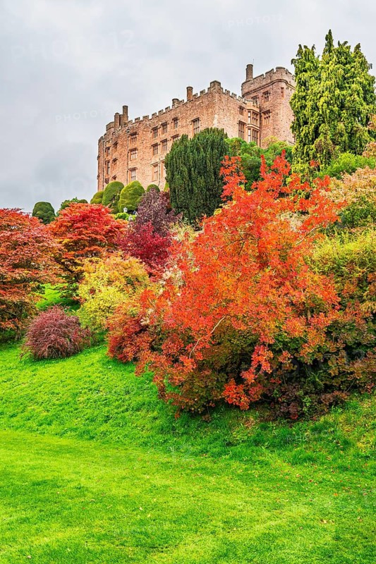 Autumn colors over Powis Castle and Garden, Welshpool, Powys, Wales, UK
