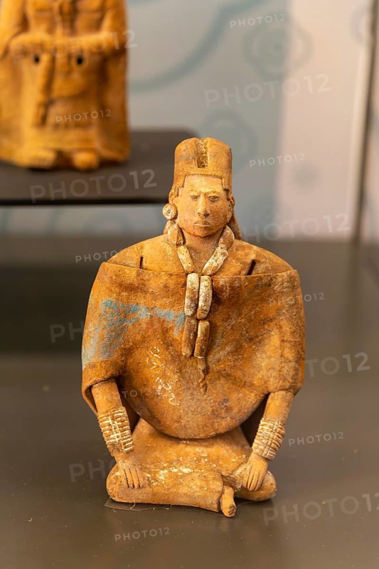 Figurine model of sitting man, from Jaina, Late Classical period, Mayan archaeological museum, Fort San Jose, Campeche, Mexico
