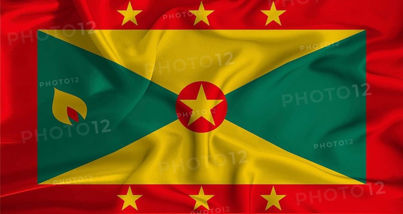 Realistic Grenada flag waving. Close up of flag of Grenada with cloth texture
