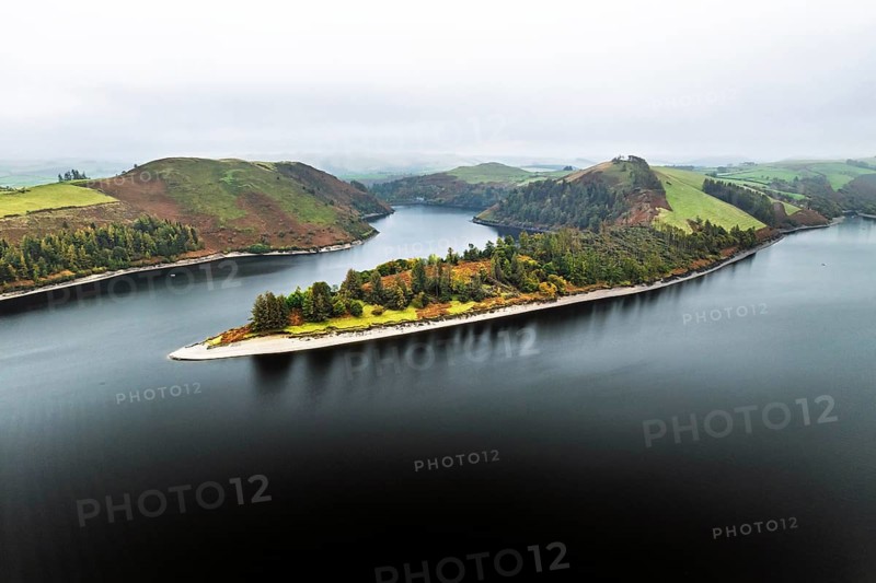 Autumn colours over Llyn Clywedog and Clywedog Reservoir from a drone, Llanidloes, Wales, UK