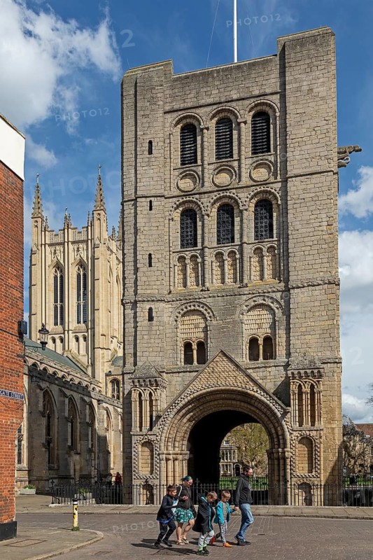 Norman tower, also called church gate, behind it St Edmundsbury Cathedral, Bury St Edmunds, West Suffolk, England, Great Britain