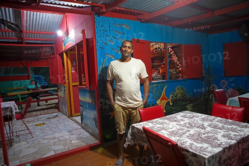 Jamaican Murphy Leniel Ennis, 45 years old, in his Jamaican restaurant in West End, Negril, Westmoreland Parish, Jamaica, West Indies, Caribbean, Central America