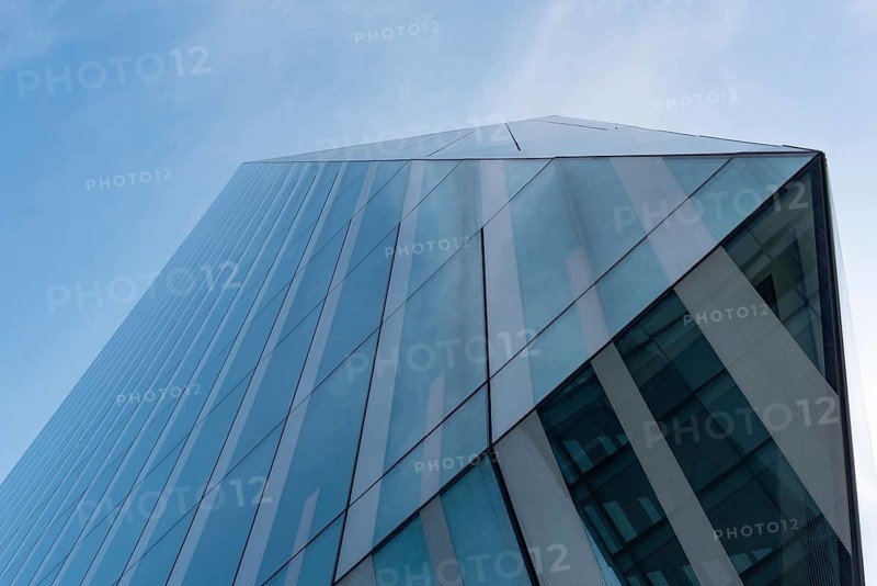 Modern high rise glass fronted British architecture, a business district on the south bank of the River Thames in London, capital city of the United Kingdom