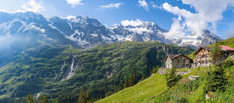Panorama, picturesque mountain landscape with Berghotel Obersteinberg, Schmadribachfall waterfall and Breithorn and Tschingelhorn mountain peaks, Bernese Alps, Bernese Oberland, Switzerland