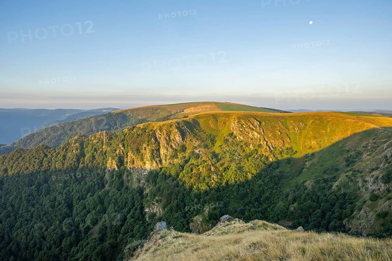The first rays of sunshine at Mount Hohneck in the Vosges Mountains, France