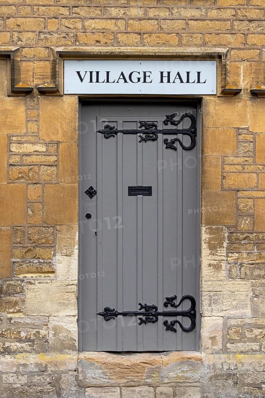 Door, house wall, Village Hall, Cotswold Stone, Bibury, The Cotswolds, England, Great Britain