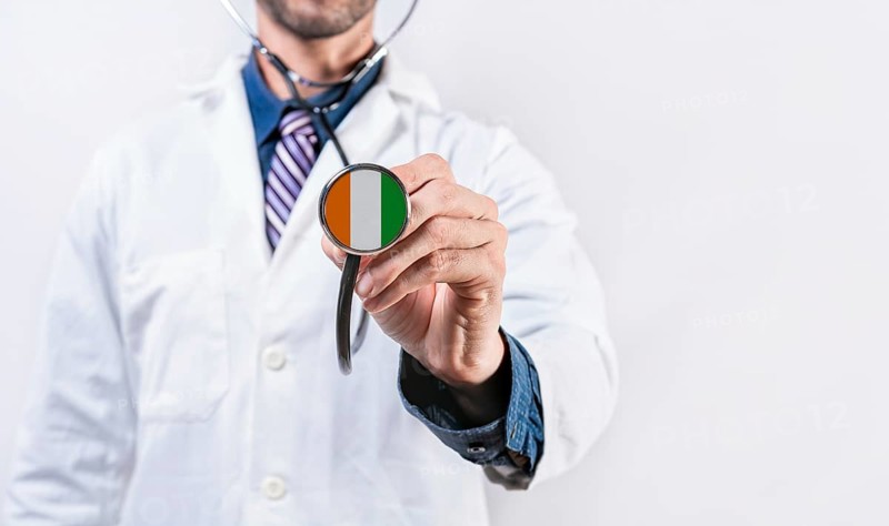 Ivory Coast healthcare system, doctor holding stethoscope. Ivory Coast health and medical insurance concept
