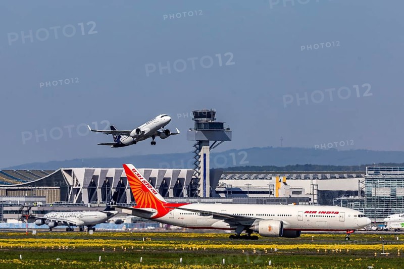 Plane taking off from Fraport Airport in Frankfurt. FRA, EDDF. Lufthansa aircraft taking off, in front of that an Air India plane. Frankfurt am Main, Hesse, Germany