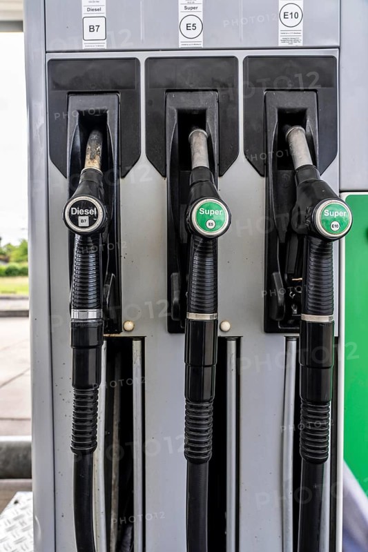 Car refueling, tap for diesel and super E5 and E10 fuels, gas pump