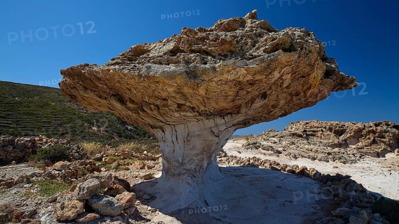 Impressive natural rock formation with rocky texture under blue sky, mushroom rocks, mushroom rock, bizarre rock, rock formation, Skiadi, Kimolos, Cyclades, Greek Islands, Greece
