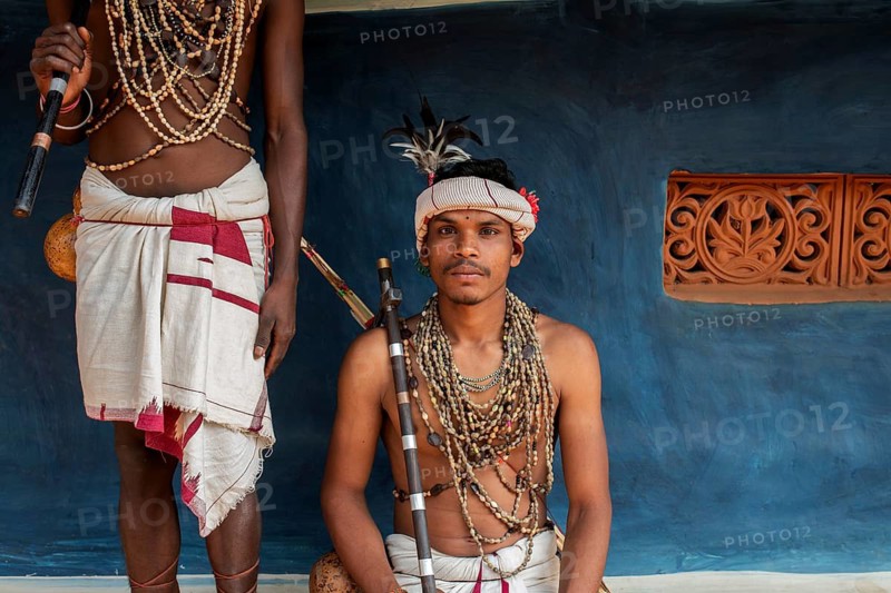 Traditionally dressed young men from the Dhurwa tribe, dance troup from Odisha, India