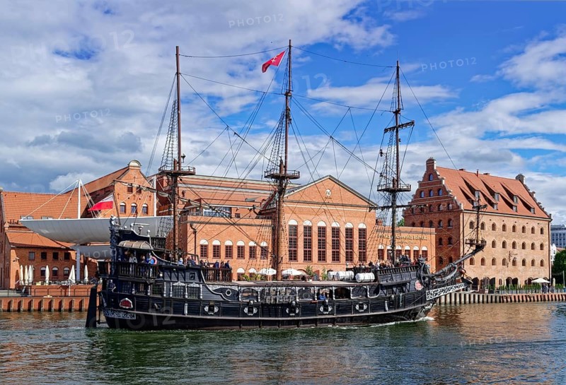 An excursion ship designed as a pirate ship on the Motlawa in the port of Danzig, former Hanseatic city and capital of the Pomeranian Voivodeship. Gdansk, Pomerania, Poland