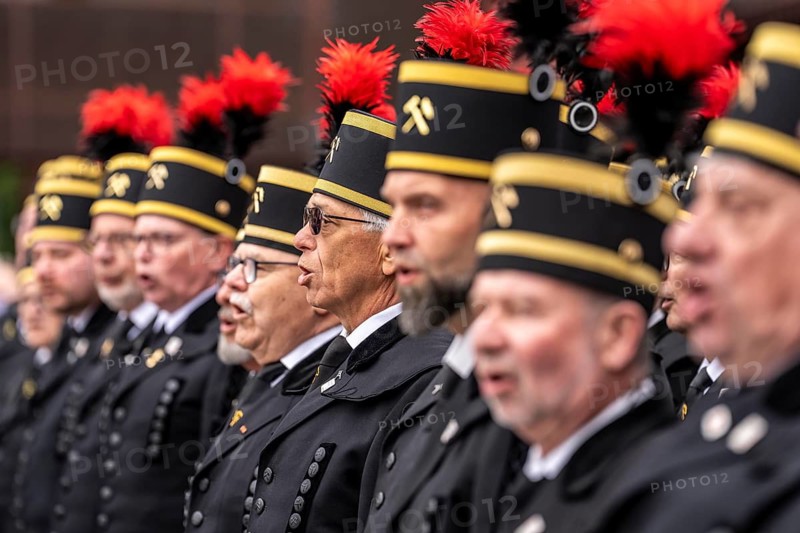The Ruhrkohle Choir, Bergmannschor, in traditional miner dress with mountain smock and chess hat with featherbush, at a concert at the Zollverein Colliery in Essen, North Rhine-Westphalia, Germany