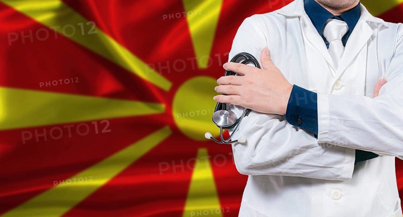 Macedonian national health system, Medical professional holding sthetoscope isolated