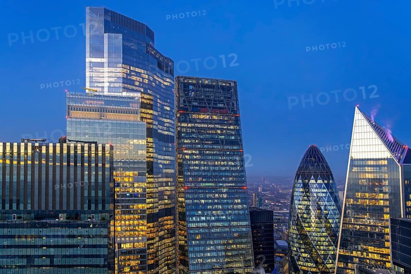 Skyline showing skyscrapers the Cheesegrater, 30 St Mary Axe, The Gherkin and The Scalpel, 52 Lime Street in City of London at night, England, UK