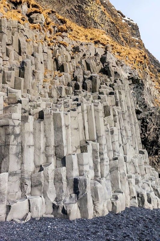 Iceland, landscape near Dyrhólaey with basalt columns on Reynisfjara beach