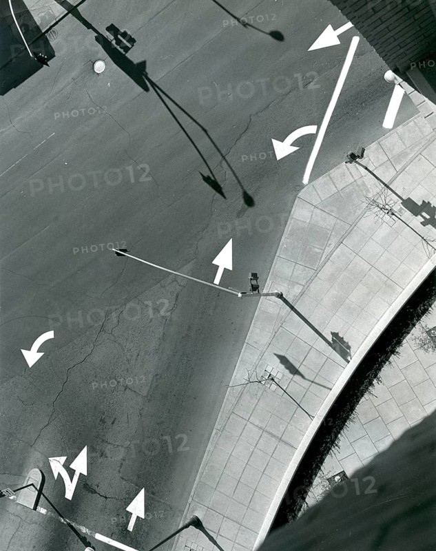 Monroe Street, Riverside Drive, intersection, Riverside, California, USA, confusing markings, aerial view of a street with white arrows and shadows from lanterns, 1945