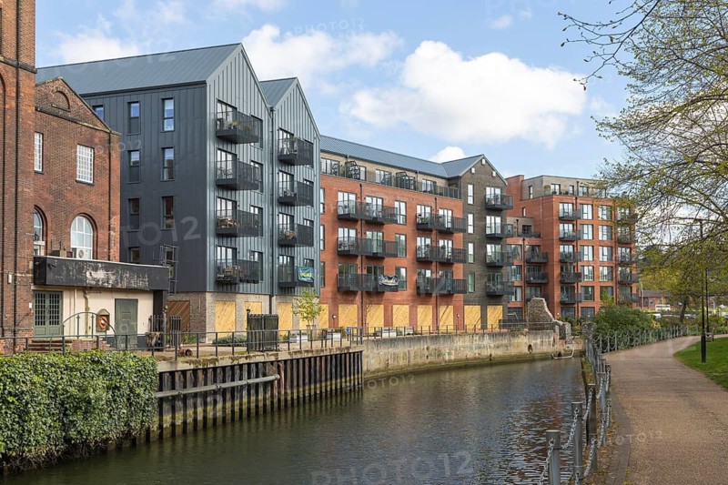 Modern housing development riverside apartments, St James Quay, River Wensum, Norwich, Norfolk, England, UK built 2021 by The Hill Group