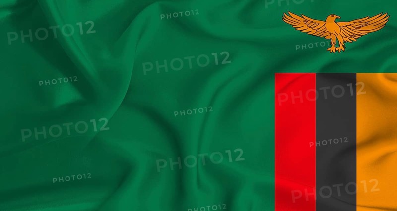 Realistic Zambia flag waving. Close up of flag of Zambia with cloth texture