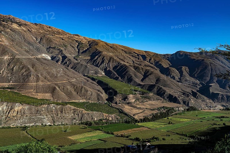 Cordillera Negra mountain range with fields in the valley floor, Black Cordillera, northern Peru, Peru, South America