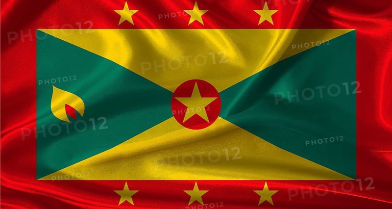 National flag of Grenada with cloth texture. Grenada flag with realistic texture background