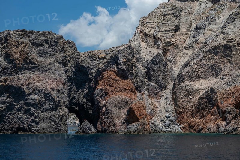 Cave, rocky coast of Lipari, Aeolian or Lipari Islands, Sicily, Southern Italy, Italy