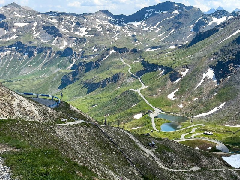 Lower right Fuscher Lacke small lake next to Grossglockner High Alpine Road in the Hohe Tauern in front of access to the Mittertörl Tunnel, Fusch, Province of Salzburg, Austria