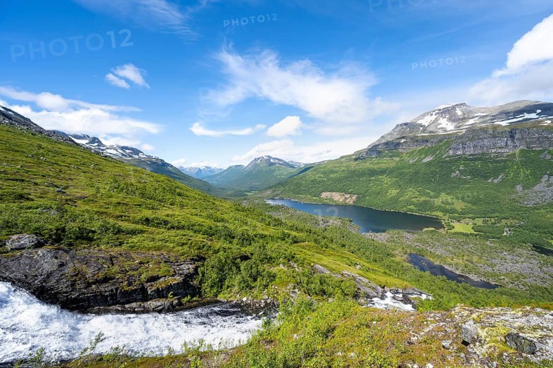 View of Innerdalen high valley with mountain landscape and lake Innerdalsvatna, waterfall on the river Flou, high valley, Sunndal, Møre og Romsdal, Vestlandet, Norway