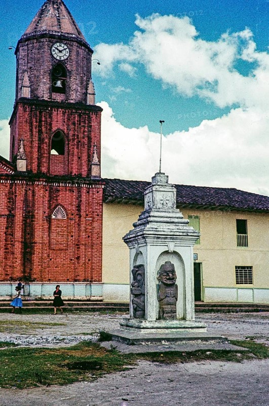 Stone megalithic statues in the town's church square, San Agustin, Colombia, South America 1961